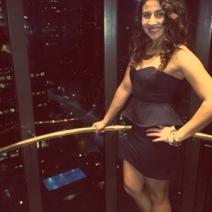 Tight mini strapless peplum black dress